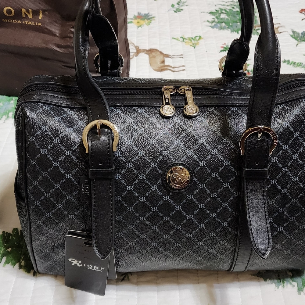 Signature Rioni Leather Handbag Speedy.